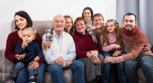 Family members are photographing best moments during Christmas dinner.