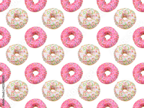 Seamless pattern.glazed doughnuts with bright colored sprinkles,isolated on a white background.