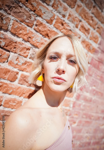 blonde woman posing on the street