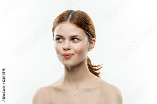 pretty woman naked shoulders cosmetics face glamor smile isolated background
