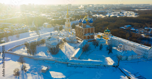 View from drone of architectural ensemble of Ryazan Kremlin with churches and cathedrals covered with snow on winter day  Russia..