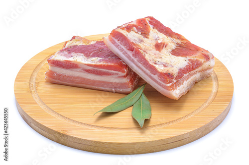 delicious homemade raw-smoked, cured bacon, lard, isolated on a white background.
