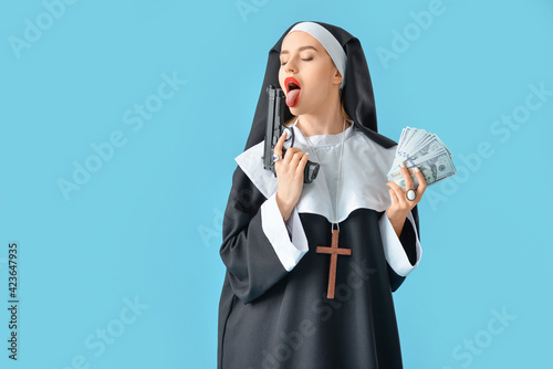 Sexy nun with gun and money...
