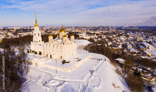 Scenic aerial view of snow covered architectural ensemble of Orthodox Dormition Cathedral in Russian town of Vladimir in winter