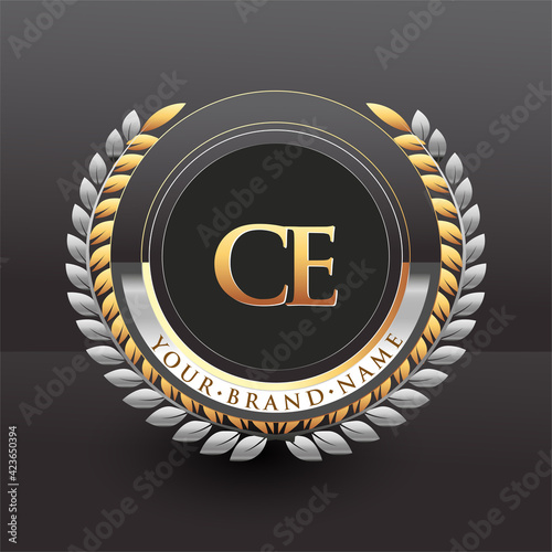 Initial logo letter CE with golden and silver color with laurel and wreath, vector logo for business and company identity.