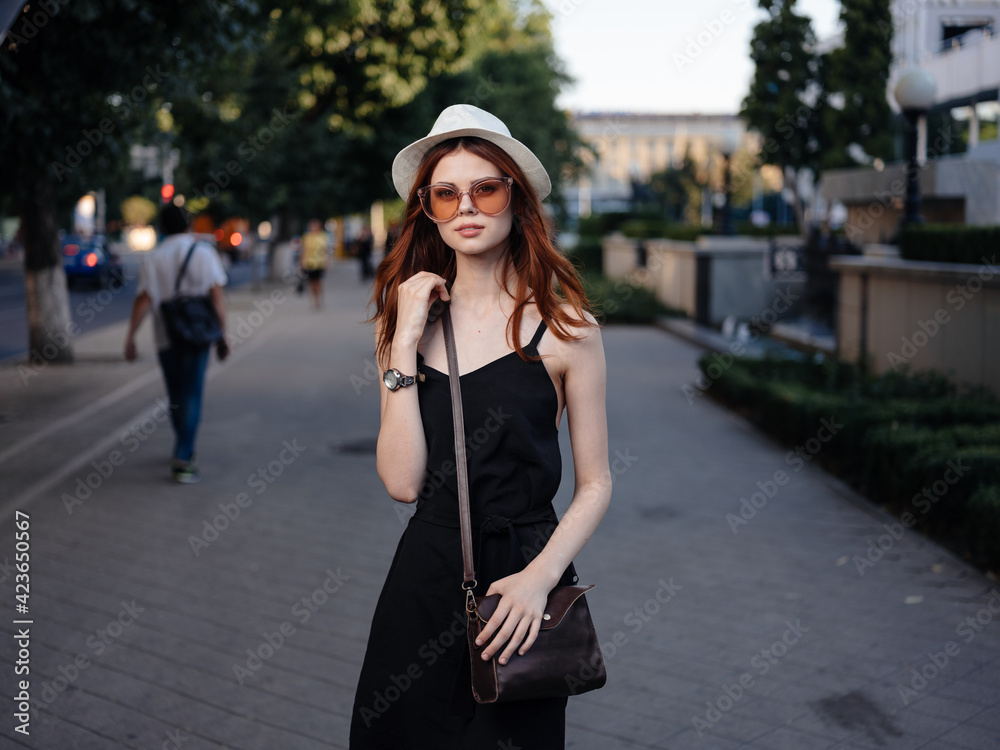 Fashionable Woman in Black Dress and Glasses Bag on Shoulder Nature Park Fashionable Woman in Black Dress and Glasses Bag on Shoulder Nature Park