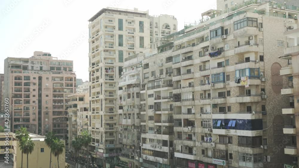 Tall buildings in a residential neighbourhood in a crowded city of Alexandria 