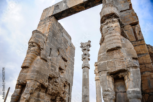 Giant statues of two lamassu creatures at the Gate of All Nations in Persepolis near Shiraz, Iran