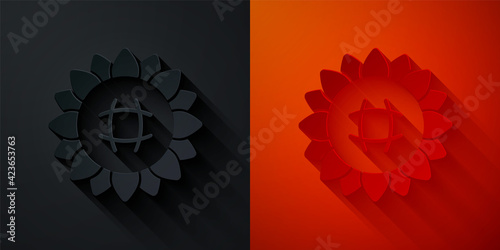 Paper cut Sunflower icon isolated on black and red background. Paper art style. Vector