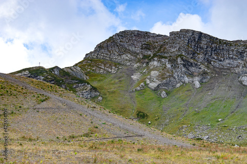 mountain landscape with rocky slopes and the cable car in Krasnaya Polyana. photo