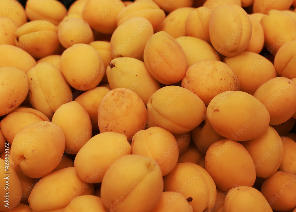 Good fruits, apricots for sale in a store, close up Good fruits, apricots for sale in a store, close up