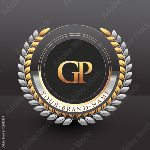 Initial logo letter GP with golden and silver color with laurel and wreath, vector logo for business and company identity.