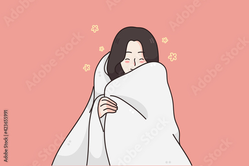 Cozy feelings, slow morning concept. Smiling sleepy young woman standing covered in white soft blanket feeling comfortable and happy vector illustration 