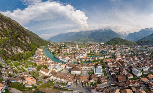 Aerial panorama of the famous Interlaken old town at the foot of the Jungfrau region in the alps in Canton Bern in Switzerland