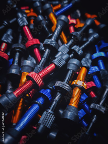 colored tubeless presta valves. bicycle tubeless rim valve stems background