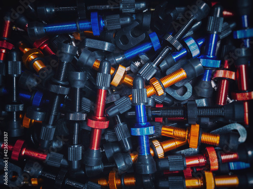 colored tubeless presta valves. bicycle tubeless rim valve stems background photo