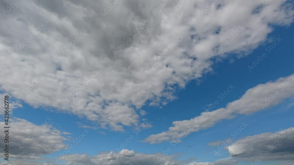 Clouds pass by blue sky as weather changes to rain cloud, time lapse Clouds pass by blue sky as weather changes to rain cloud, time lapse
