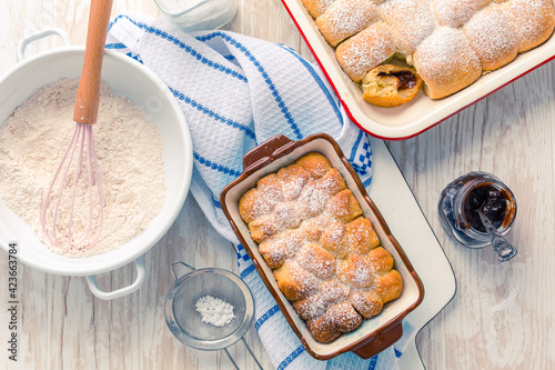 Fotografi Sweet rolls, Buchteln filled with plum jam or jelly