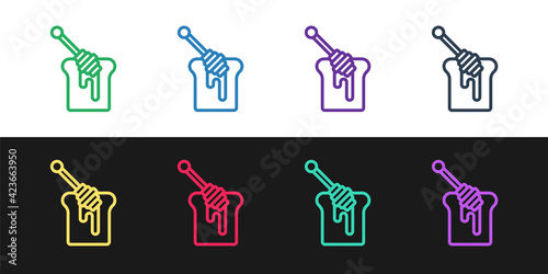 Set line Honey dipper stick with dripping honey icon isolated on black and white background. Honey ladle. Vector