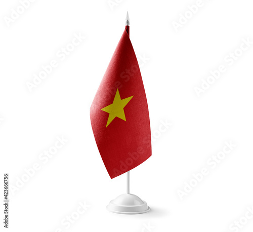 Small national flag of the Vietnam on a white background
