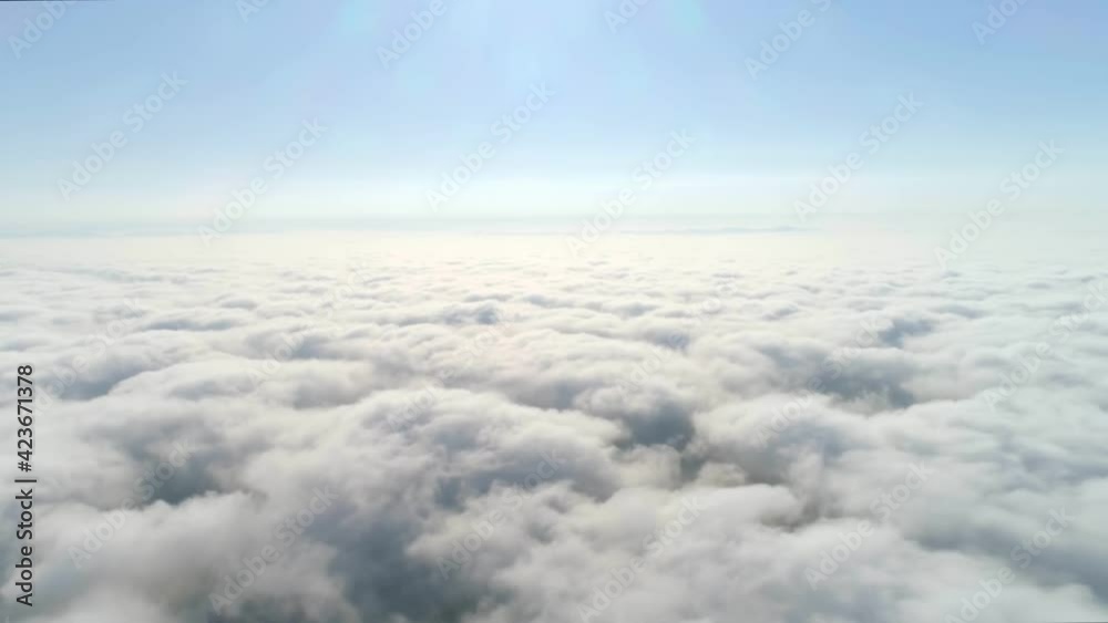 Aerial view of clouds moving in blue sky, time-lapse Aerial view of clouds moving in blue sky, time-lapse