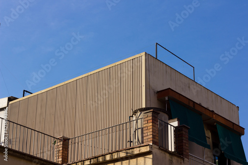 Building corners, working class neighbourhood windows