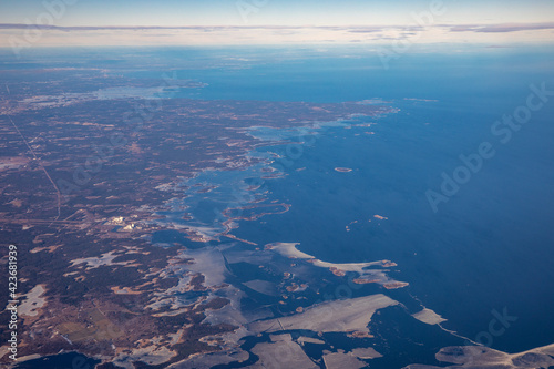View from the plane on the winter scenery of Sweden.
