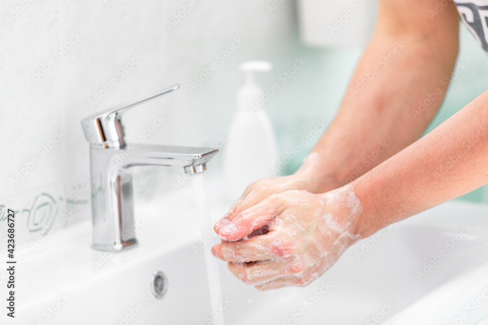 thorough hand washing with soap and water to prevent coronavirus - Image thorough hand washing with soap and water to prevent coronavirus - Image
