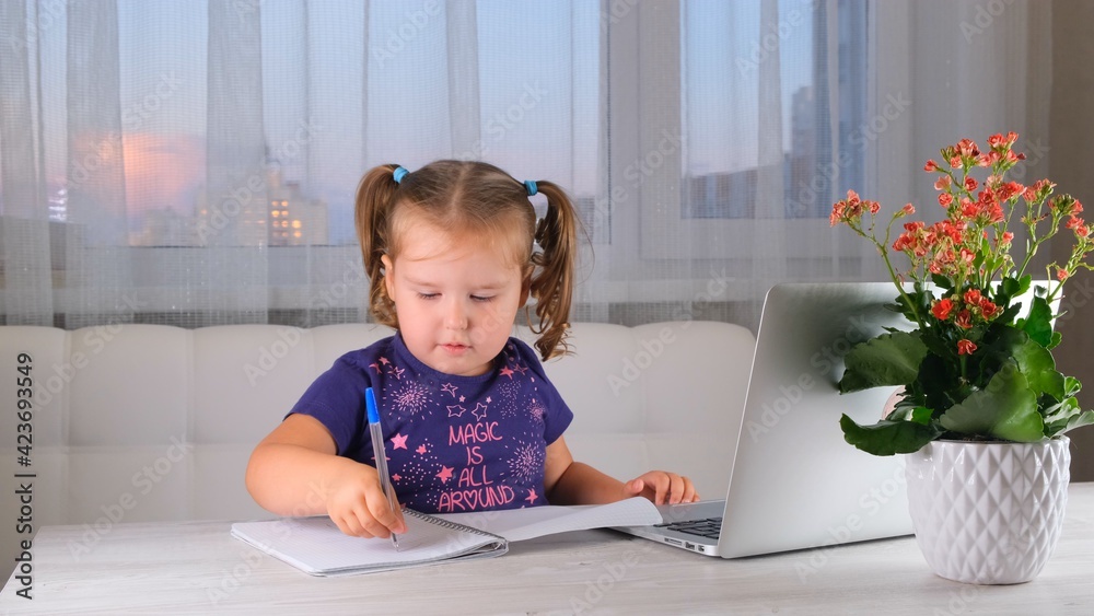 Online lessons for children. Homeschooling and distance education for kids. Girl student study online with video call teacher Online lessons for children. Homeschooling and distance education for kids. Girl student study online with video call teacher