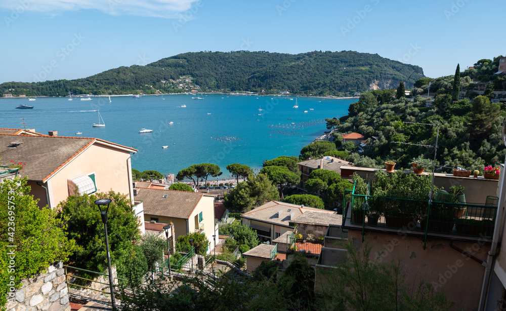 Portovenere, Liguria, Italy. June 2020. Sea view from the village hill: a magnificent view of the bay crossed by numerous boats of various sizes.