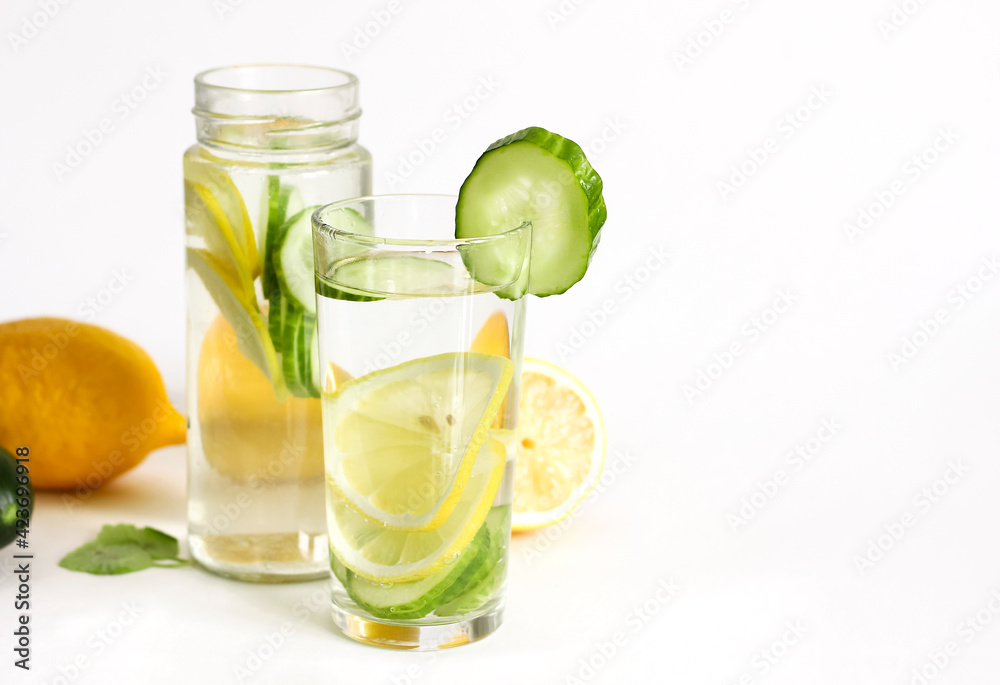 Fototapeta premium A glass of detox and fruit are on the table.