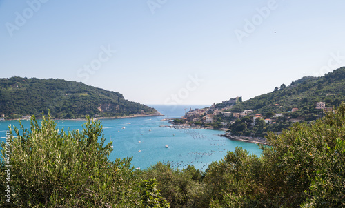 Portovenere, Liguria, Italy. June 2020. Sea view from the village hill: a magnificent view of the bay crossed by numerous boats of various sizes.