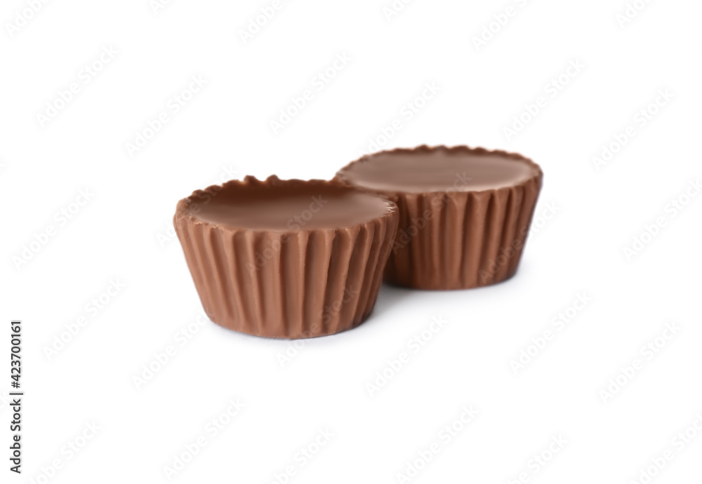 Sweet peanut butter cups isolated on white Sweet peanut butter cups isolated on white