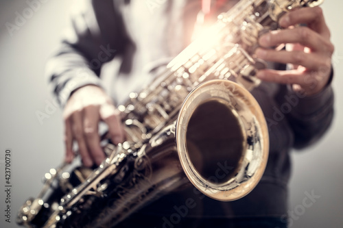 Fotografie Saxophonist playing a saxophone