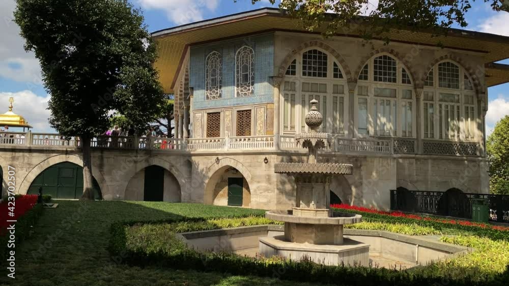 Camera rises to show ornate architecture of Topkapi Palace in Istanbul 