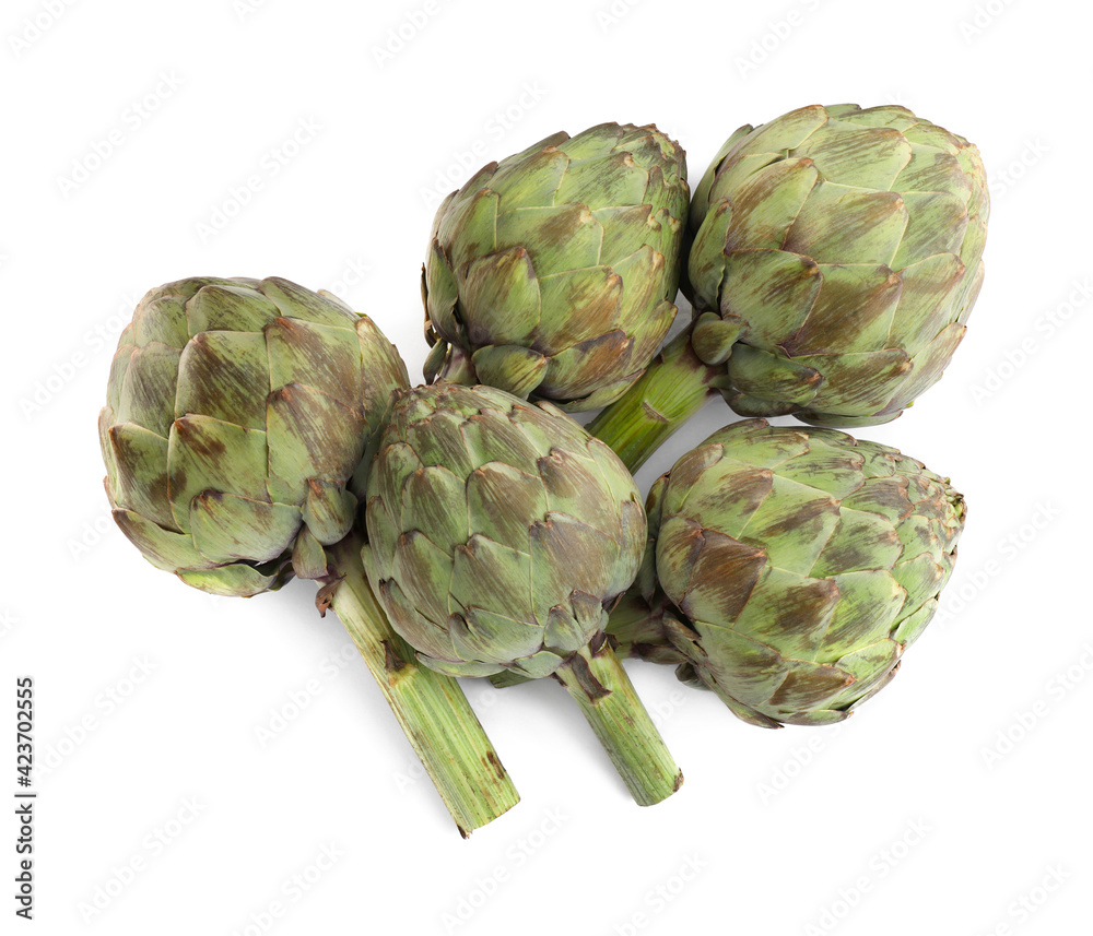 Fototapeta premium Whole fresh raw artichokes on white background, top view