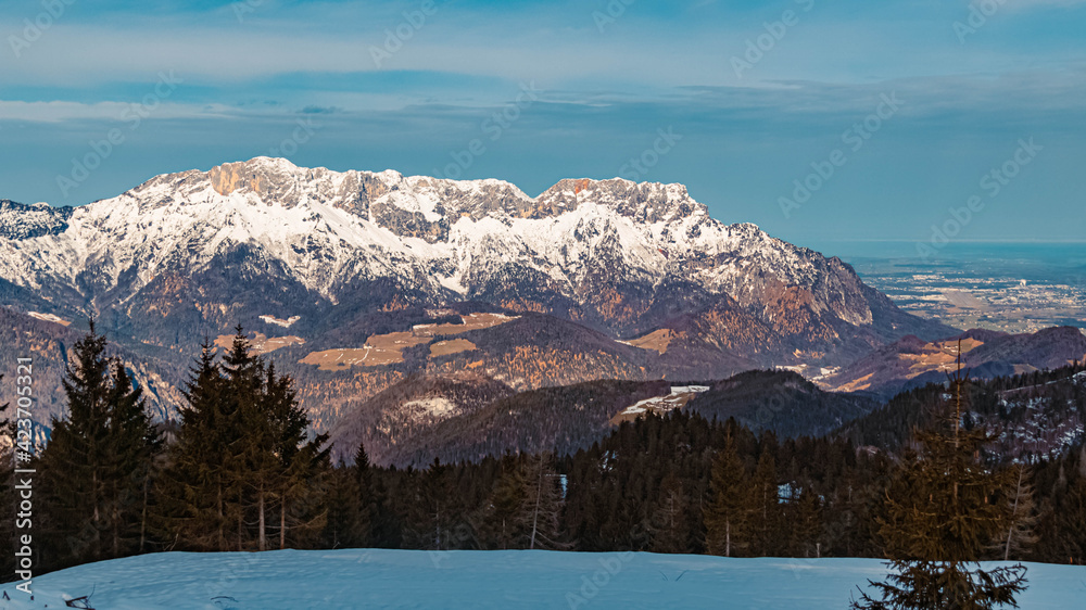 Beautiful winter landscape at the famous Rossfeldstrasse near Berchtesgaden, Bavaria, Germany with the famous Untersberg summit in the background