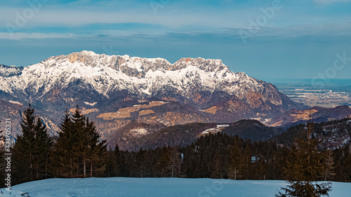 Beautiful winter landscape at the famous Rossfeldstrasse near Berchtesgaden, Bavaria, Germany with the famous Untersberg summit in the background