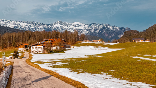 Beautiful winter landscape near Berchtesgaden, Bavaria, Germany with the famous resting witch summit in the background
