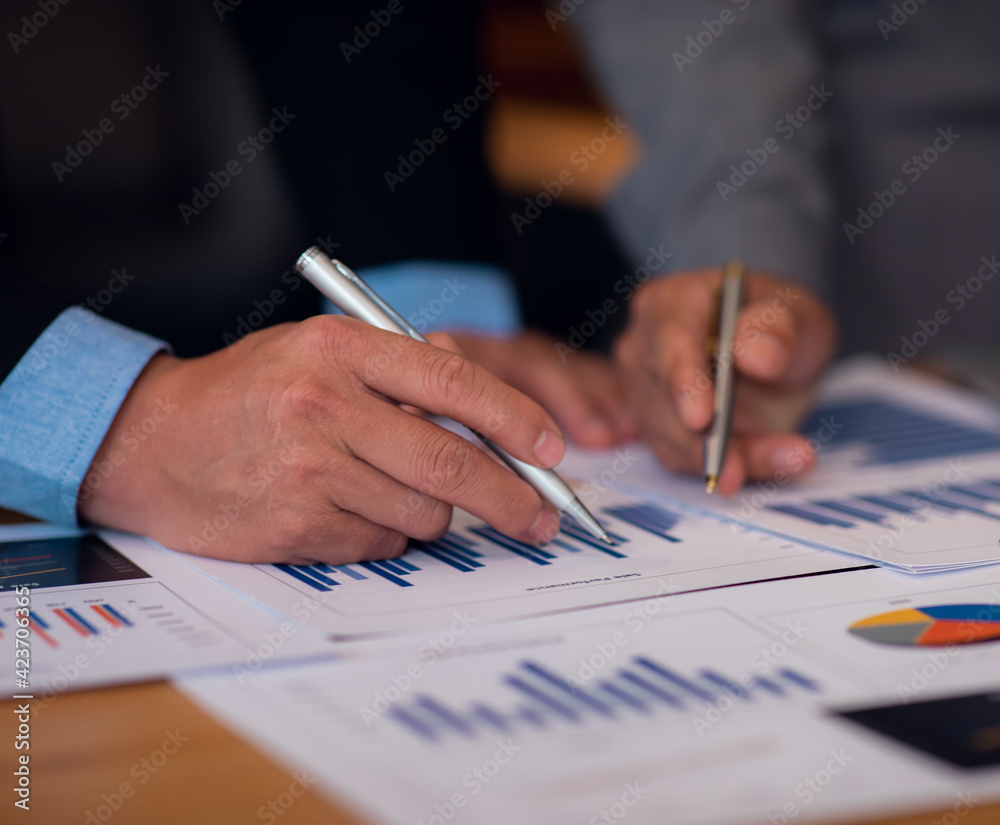Team of business people working together in the meeting room office, teamwork background charts and graphs banner, double exposure successful teamwork,business planning concept. Team of business people working together in the meeting room office, teamwork background charts and graphs banner, double exposure successful teamwork,business planning concept.