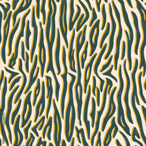 Seamless pattern. Imitation of skin of tiger. Grey and golden stripes on beige background. Animal print. Striped pattern.