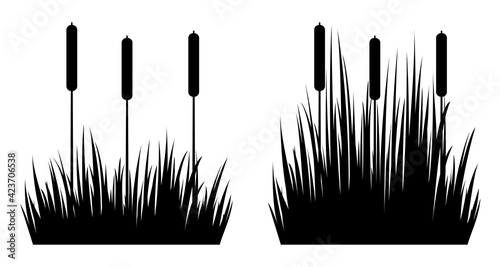 Set of silhouettes of reeds in the grass.