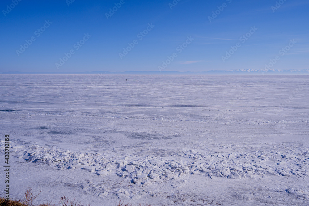 Landscape with snow.  Winter on the lake Baikal