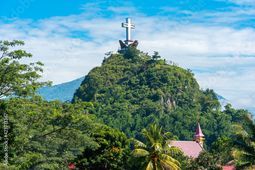 The cross monument of Rantepao, situated on the Buntu Singki  hill in the south province of Sulawesi. From the top you'll get panoramic views across  the surrounding countryside of Tana Toraja photo