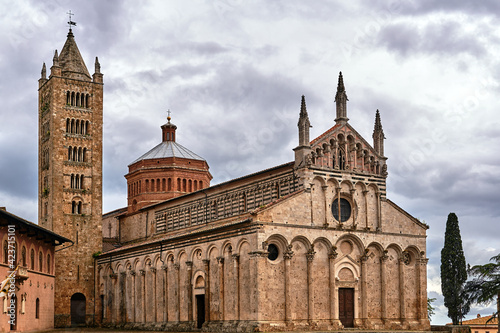 historic stone church with a belfry in the city of Massa Maritima