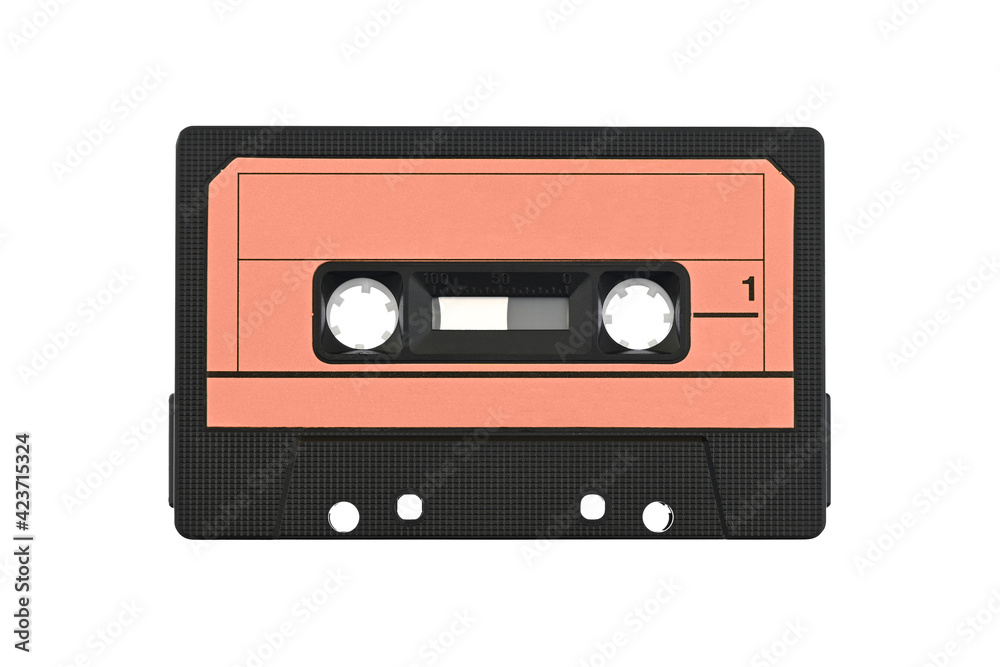 Cassette tape isolated on white. Vintage audio cassette, retro red coloring.