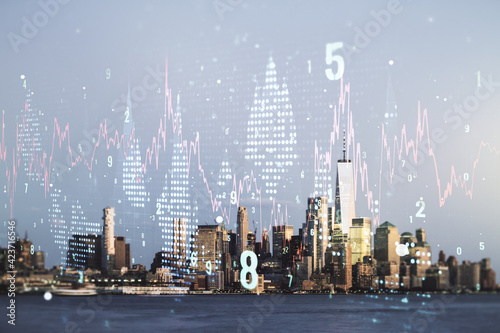 Abstract virtual financial graph hologram on New York skyline background, forex and investment concept. Multiexposure © Pixels Hunter