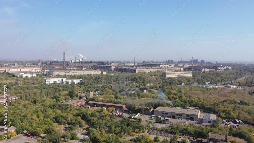 Aerial view. Industrial plants within the city. Environmental pollution. Aerial view. Industrial plants within the city. Environmental pollution.