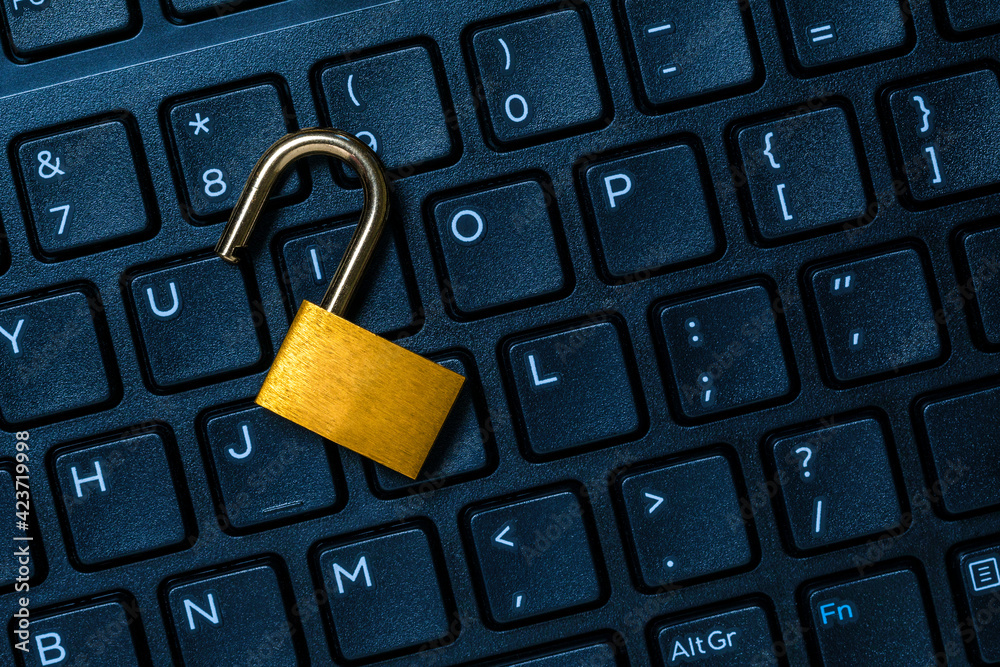 Unlocked security lock on computer keyboard Unlocked security lock on computer keyboard