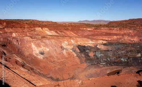 Obraz na płótnie Deep pit of red iron ore mine in Pilbara region in Western Australia w salonie